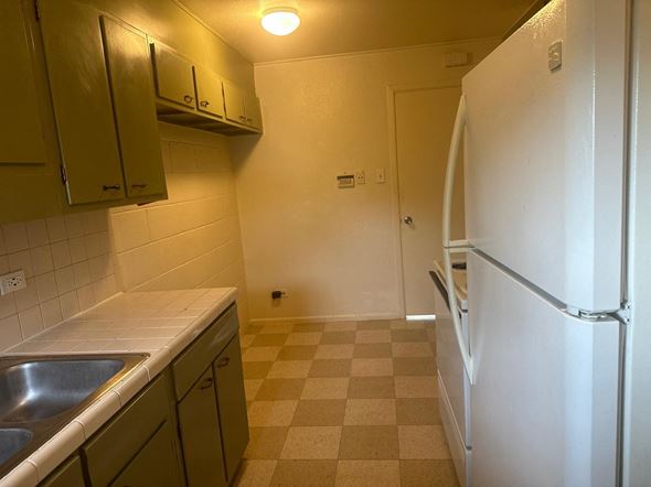 Laredo apartment for rent - a kitchen with a sink and a refrigerator
