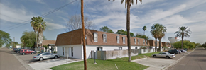 Laredo apartment for rent - a row of houses on a street with palm trees