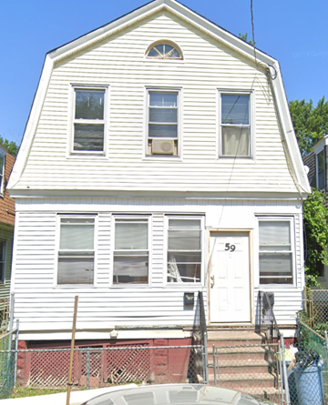 Irvington apartment for rent - the front of a white house with a white