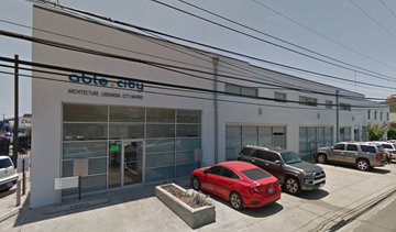 Laredo apartment for rent - the front of a dealership with cars parked outside