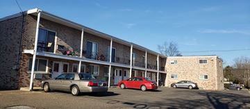 Haddon Heights apartment for rent - a row of cars parked in front of a building