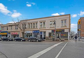 Oshawa apartment for rent - a large building on the corner of a city street