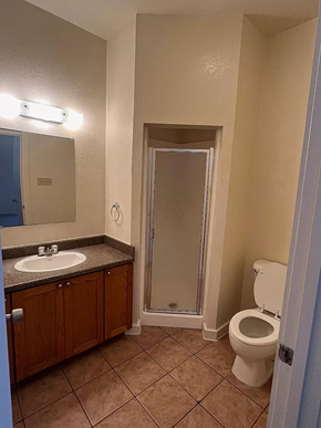 Laredo apartment for rent - a bathroom with a sink toilet and a shower
