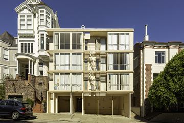 San Francisco apartment for rent - A large, multi-story building with a mix of modern and traditional architecture.