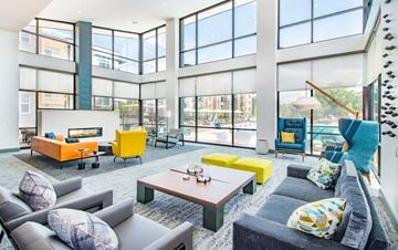 Westminster apartment for rent - a living room with couches and chairs and a fireplace