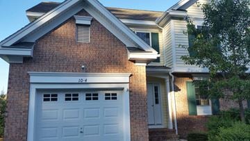 Concord apartment for rent - a house with a white garage door in front of it