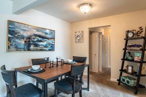 Glen Burnie apartment for rent - a dining room with a table and chairs