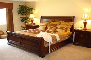 Cranston apartment for rent - a bedroom with a bed and two lamps