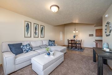 Sioux Falls townhouse for rent - a living room with a couch and a table