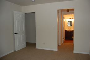 Lake Bluff apartment for rent - an empty living room with a door open to a bathroom