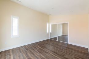 Hawthorne apartment for rent - a living room with a hard wood floor and white walls
