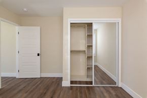 Hawthorne apartment for rent - a bedroom with a closet and an open door