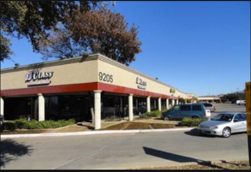 Dallas apartment for rent - an empty gas station with cars parked in a parking lot