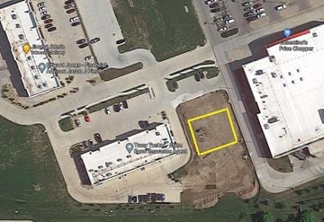 Kearney apartment for rent - A satellite image shows a parking lot and a building with a yellow square highlighting a specific area.