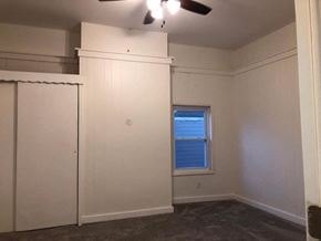 Morrow apartment for rent - A room with a window and a ceiling fan.