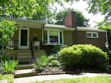 Mt. Lebanon house for rent - A house with a front porch and a small garden.