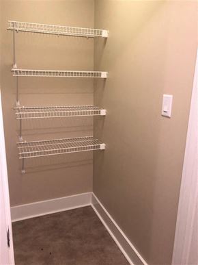 Saint Louis apartment for rent - a walk in closet with shelves and empty shelves