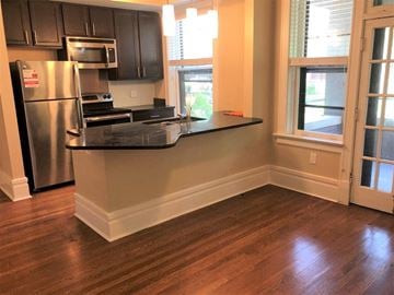 Saint Louis apartment for rent - a kitchen with a counter top and a refrigerator