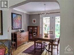 Ottawa house for rent - A room with a dining table and chairs.