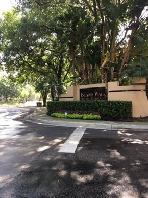 Tampa house for rent - a street with a sign in front of a building