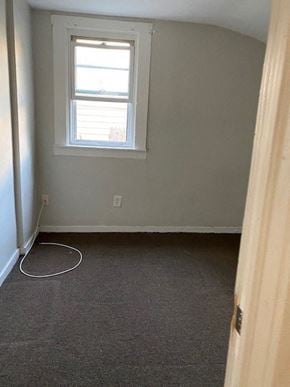 Buffalo apartment for rent - an empty room with a window and a carpet