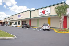 Jacksonville apartment for rent - A parking lot in front of La Core Christian Elementary school.