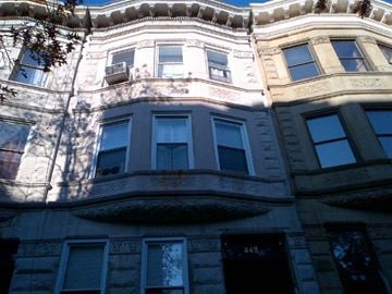 New York apartment for rent - a tall building with a lot of windows on it