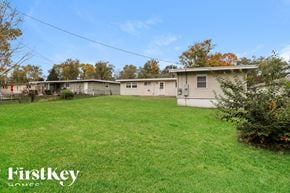 Florissant house for rent - a group of mobile homes in a grassy yard