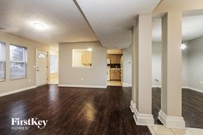Brownsburg house for rent - the living room and dining room of an empty house