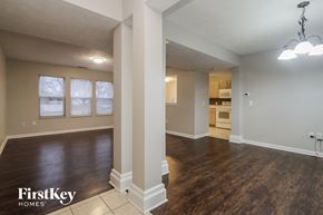 Brownsburg house for rent - the living room and dining room of an empty house