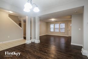 Brownsburg house for rent - the living room and dining room in an empty house