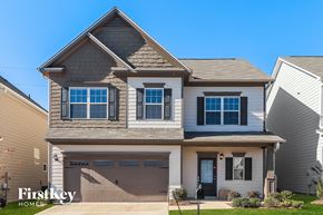 Cartersville house for rent - A two-story house with a garage is for sale.