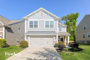 Charlotte house for rent - a white house with a white garage door