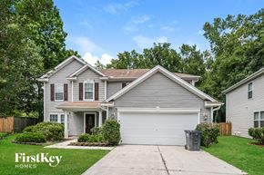 Summerville house for rent - A two-story house with a garage is for sale by FirstKey Homes.