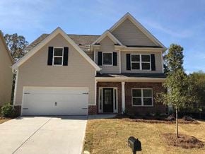 Newnan house for rent - a house with a white garage door