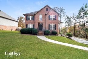 Helena house for rent - a brick house with a sidewalk in front of it