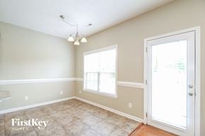 Clemmons house for rent - a dining room with a door and a window