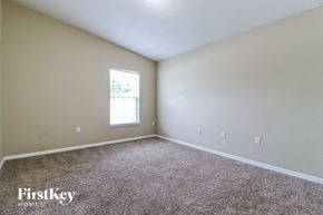Winter Haven house for rent - a bedroom with carpet and a window