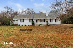 Locust Grove house for rent - a white house with a yard in front of it