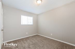 Phoenix house for rent - the bedroom of a home with carpet and a window