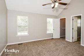 Adairsville house for rent - the master bedroom has a closet and a ceiling fan