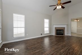 Birmingham house for rent - the living room with wood flooring and a fireplace
