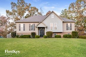 Odenville house for rent - a home with a large lawn in front of it