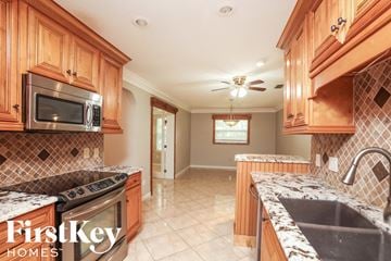 Altamonte Springs house for rent - A kitchen with wooden cabinets and a FirstKey Homes logo.