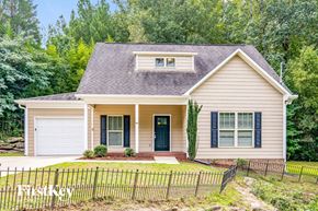 Gardendale house for rent - A house with a black fence in front of it.