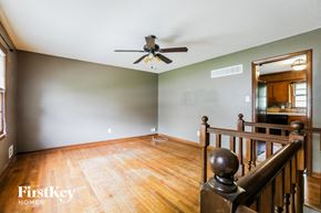 Lee's Summit house for rent - the living room and dining room from the top of the stairs