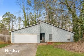 Acworth house for rent - A garage with a FirstKey Homes logo.