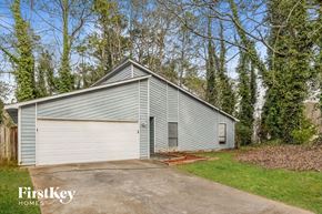 Acworth house for rent - A garage with a FirstKey Homes logo.