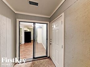 Arlington house for rent - the master bedroom has a large mirror and a door to the hallway