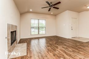 Lancaster house for rent - the living room has a fireplace and hardwood floors